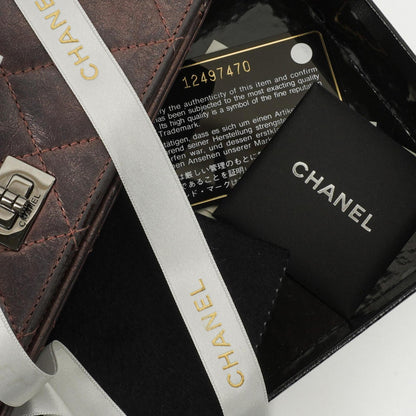 Chanel Lila Stepp-Altes Kalbsleder Reissue 2.55 Yen Geldbörse