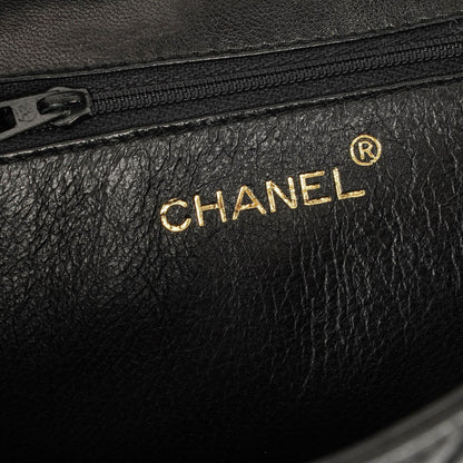 Chanel Vintage Tassel Flap Tasche aus schwarzem gestepptem Lammleder