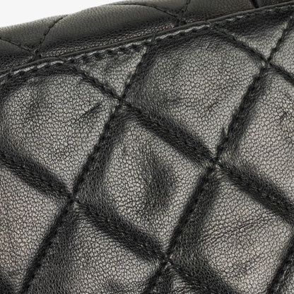 Chanel Vintage Tassel Flap Tasche aus schwarzem gestepptem Lammleder