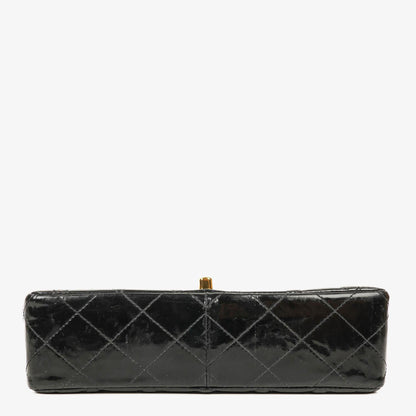 Chanel Single Flap Bag aus schwarzem gestepptem Lackleder mit 24K vergoldeten Beschlägen
