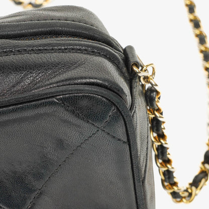 Chanel Kleine Camera Umhängetasche aus schwarzem Leder mit Quaste