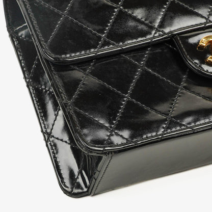 Chanel Kleine Classic Single Flap Tasche aus schwarzem gestepptem Lackleder mit 24K vergoldeter Hardware
