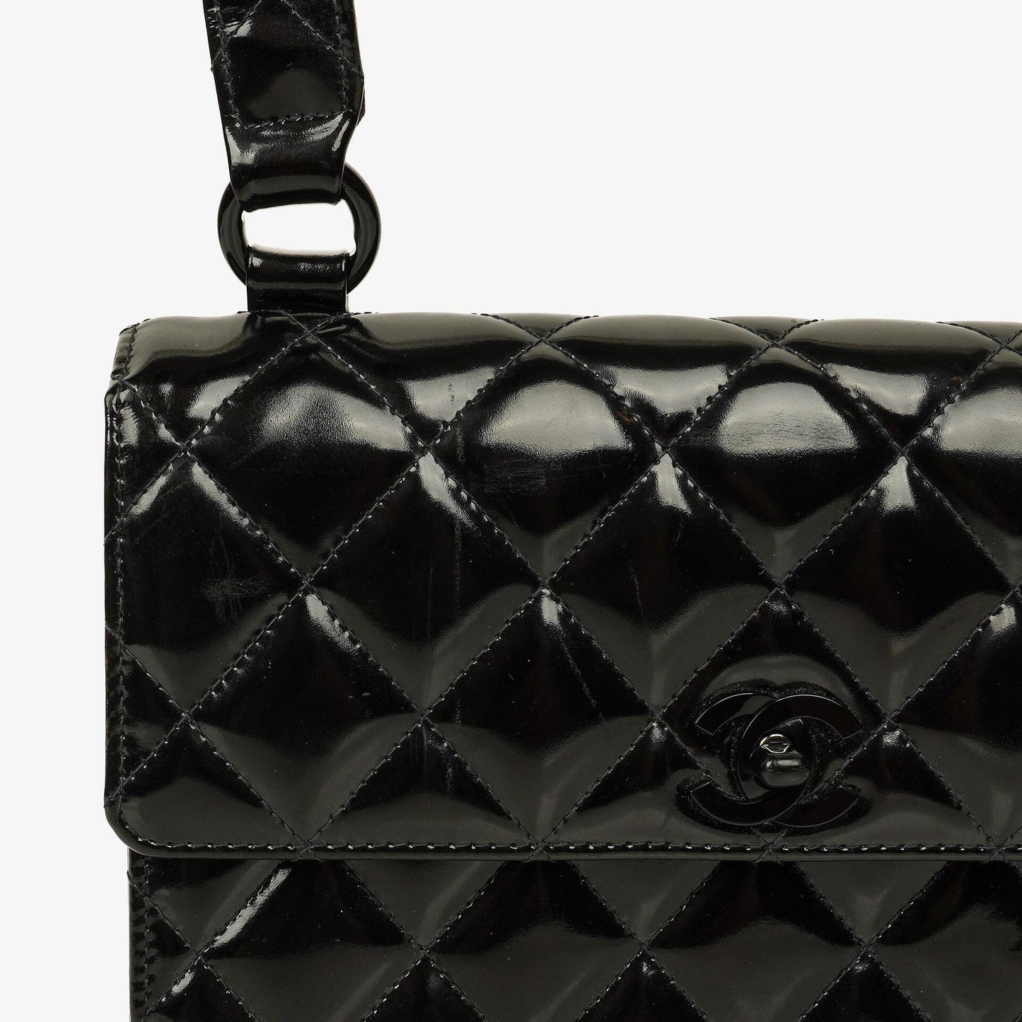 Chanel Small Single Flap Bag aus schwarzem gestepptem Lackleder