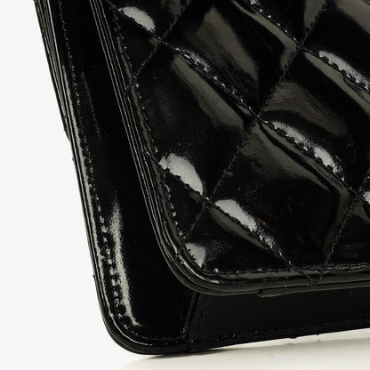 Chanel Small Single Flap Bag aus schwarzem gestepptem Lackleder