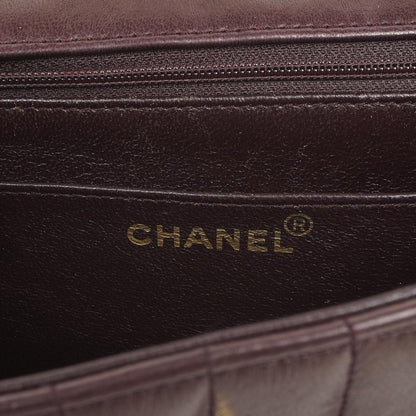 Chanel Kleine Vintage Classic Flap Tasche aus schokoladenbraunem vertikal gestepptem Lammleder mit 24K-vergoldeter Hardware