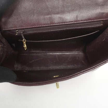 Chanel Kleine Vintage Classic Flap Tasche aus schokoladenbraunem vertikal gestepptem Lammleder mit 24K-vergoldeter Hardware