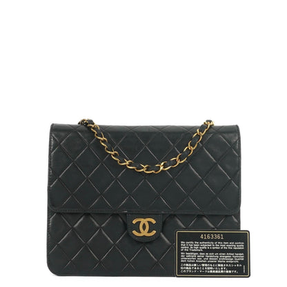 Chanel Zeitlose Klassische Kleine Flap Tasche in Schwarz Gepolstertes Lammleder und 24K Vergoldete Beschläge
