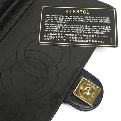 Chanel Zeitlose Klassische Kleine Flap Tasche in Schwarz Gepolstertes Lammleder und 24K Vergoldete Beschläge