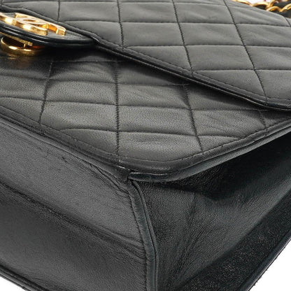 Chanel Zeitlose Klassische Kleine Flap Tasche in Schwarz Gepolstertes Lammleder und 24K Vergoldete Beschläge