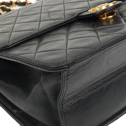Chanel Zeitlose Klassische Kleine Flap Tasche in Schwarz Gepolstertes Lammleder und 24K Vergoldete Beschläge