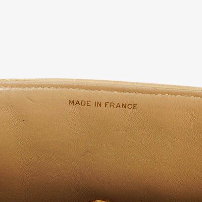 Chanel Vintage Flap Bag aus beige Lammleder mit vertikaler Steppung