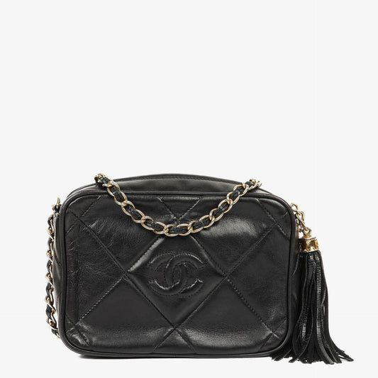 Chanel Vintage Camera Tasche mit Quaste CC aus schwarzem gestepptem Leder