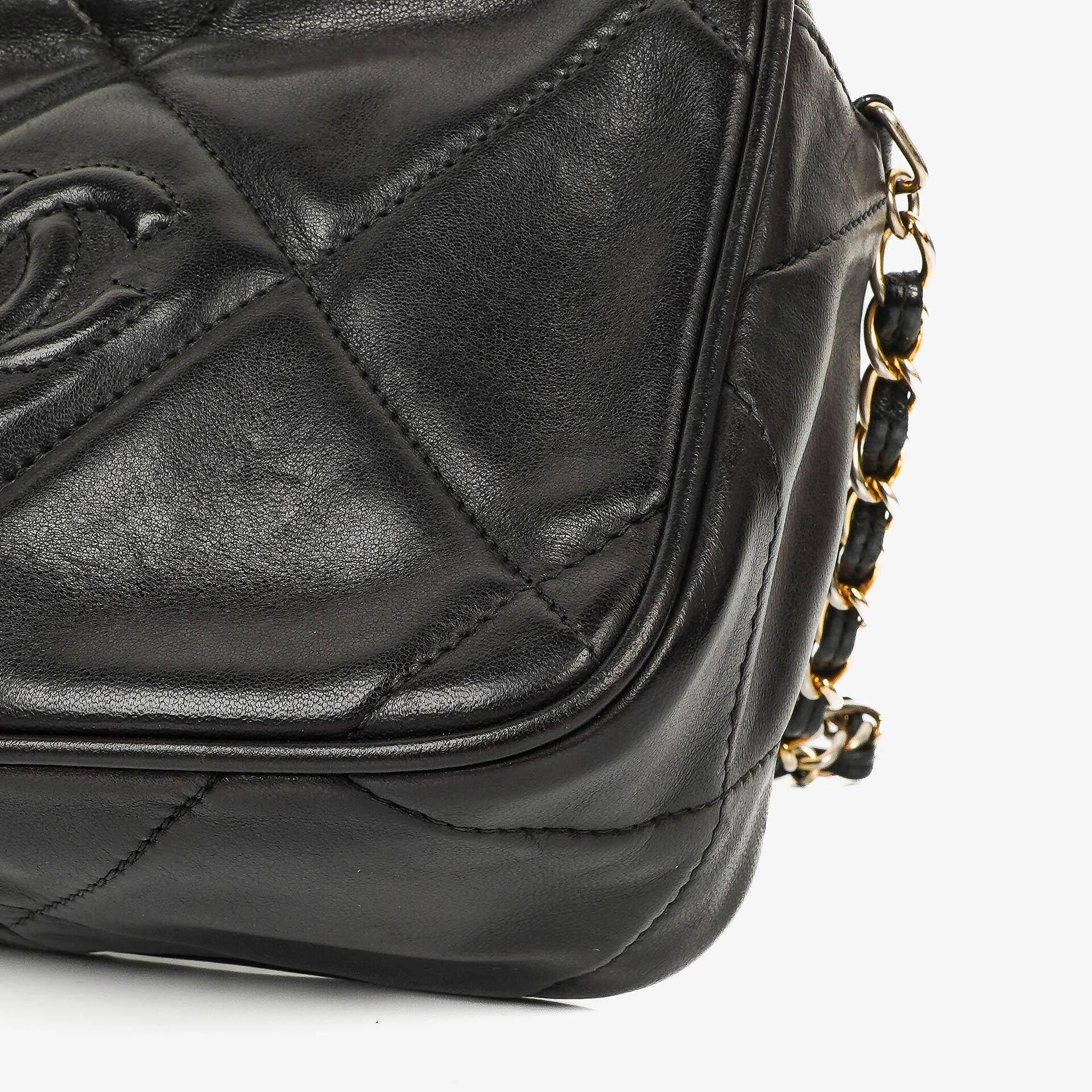 Chanel Vintage Camera Tasche mit Quaste CC aus schwarzem gestepptem Leder