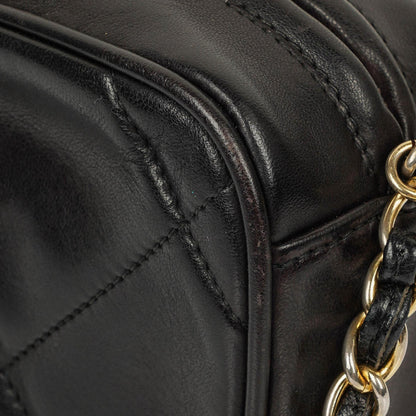Chanel Vintage Camera Tasche mit Quaste CC aus schwarzem gestepptem Leder