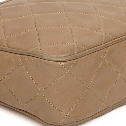 Chanel Vintage Kamera Quaste Tasche CC Fronttasche Beige Gequiltetes Lammleder