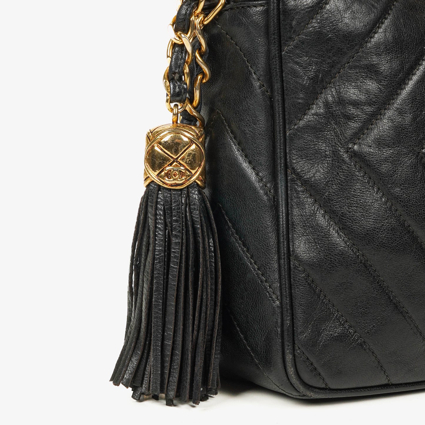 CHANEL Vintage CC Kamera-Quasten-Tasche aus schwarzem Lammleder