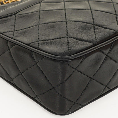 Chanel Vintage Camera Tassel Medium Umhängetasche aus schwarzem gestepptem Lammleder mit CC-Fronttasche, 1991-1994