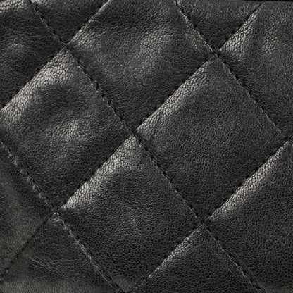 Chanel Vintage Camera Tasche aus schwarzem gestepptem Lammleder mit Quaste