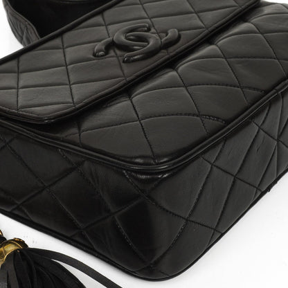 Chanel Vintage Camera Tassel CC Flap Pocket Tasche aus schwarzem gestepptem Lammleder mit Goldbeschlägen