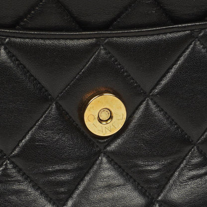 Chanel Vintage Camera Tassel CC Flap Pocket Tasche aus schwarzem gestepptem Lammleder mit Goldbeschlägen