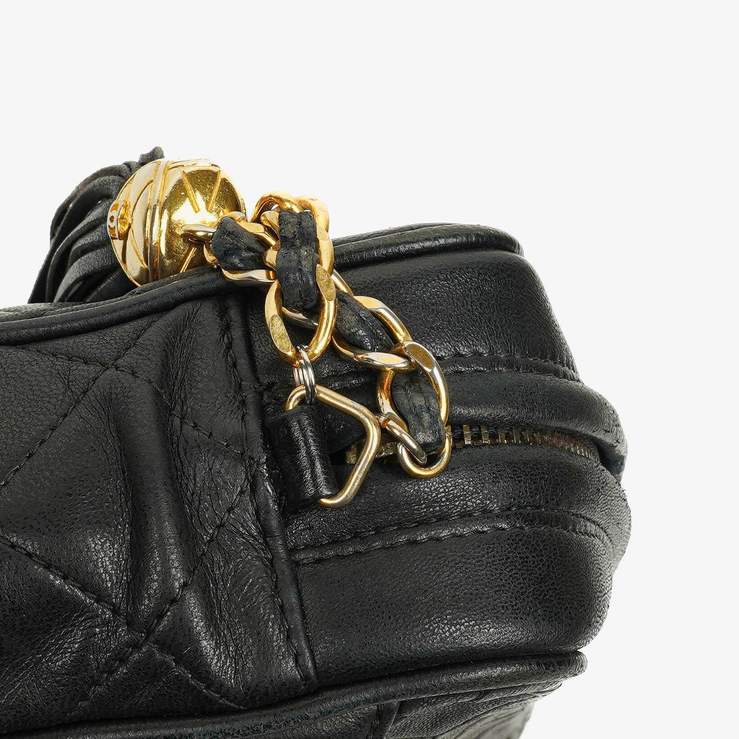 CHANEL Vintage CC Kamera-Quasten-Tasche aus schwarzem gestepptem Lammleder