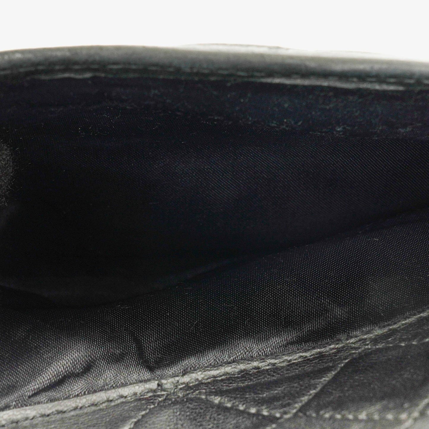 CHANEL Vintage CC Kamera-Quasten-Tasche aus schwarzem gestepptem Lammleder