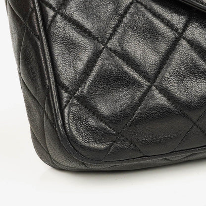 Chanel Vintage CC Camera Tassel Bag aus schwarzem gestepptem Lammleder
