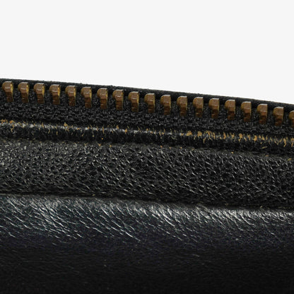 Chanel Vintage CC Camera Bag aus schwarzem gestepptem Lammleder mit Quaste