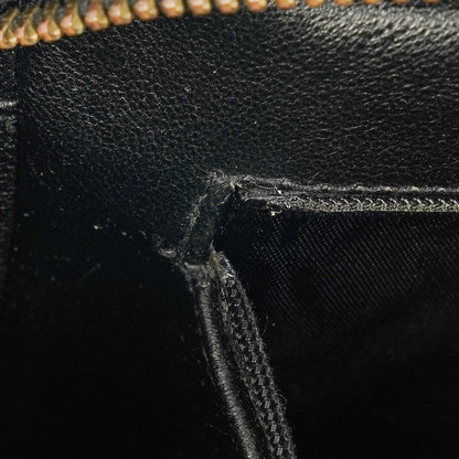 Chanel Vintage CC Kamera-Tasche aus schwarzem gestepptem Lammleder mit Quaste