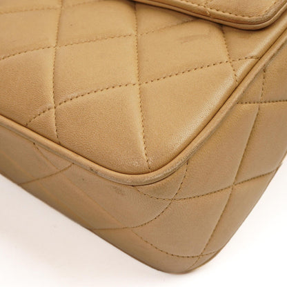 Chanel Vintage Mittlere Kamera Quaste CC Frontklappen Tasche aus beigem gestepptem Lammleder