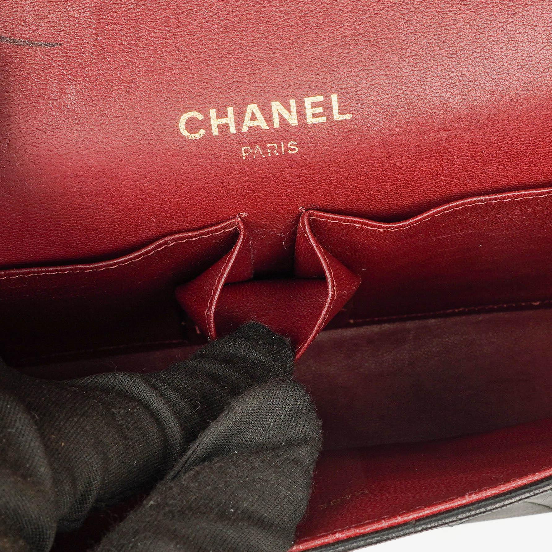 Chanel Vintage Mittelgroße Timeless Classic Double Flap Tasche aus schwarzem gestepptem Lammleder mit 24K vergoldeter Hardware und Mademoiselle-Kette