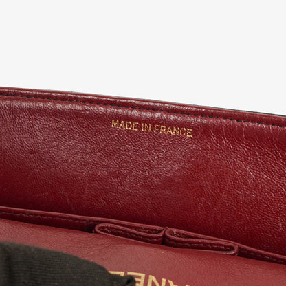Chanel Vintage Medium Timeless Classic Double Flap Tasche aus schwarzem gestepptem Lammleder mit 24K vergoldeter Hardware und Mademoiselle-Kette