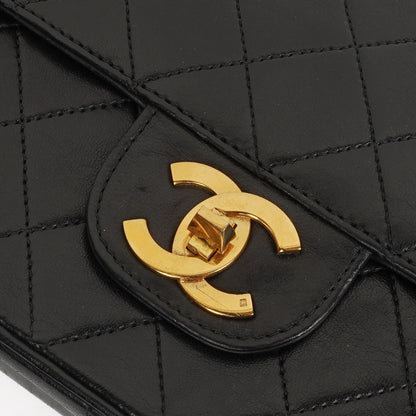 Chanel Vintage Medium Timeless Classic Double Flap Tasche aus schwarzem gestepptem Lammleder mit 24K vergoldeter Hardware und Mademoiselle Kette