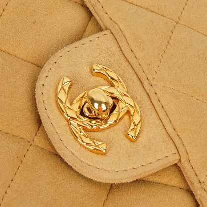 Chanel Vintage Small Camera Tassel Bag aus goldfarbenem gestepptem Wildleder mit CC Logo Fronttasche