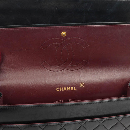 Chanel Vintage zeitlose klassische mittlere Doppelklappen-Tasche Schwarz gestepptes Lammleder mit 24K goldplattierter Hardware und Mademoiselle-Kette