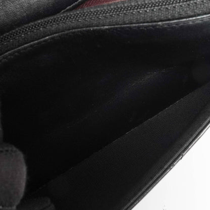 Chanel Wallet On Chain WOC schwarzes gestepptes Lammleder mit goldfarbenen Beschlägen