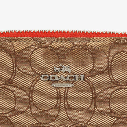 Coach Nolita 15 Mini Tasche aus Signature Canvas