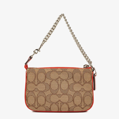 Coach Nolita 15 Mini Tasche aus Signature Canvas