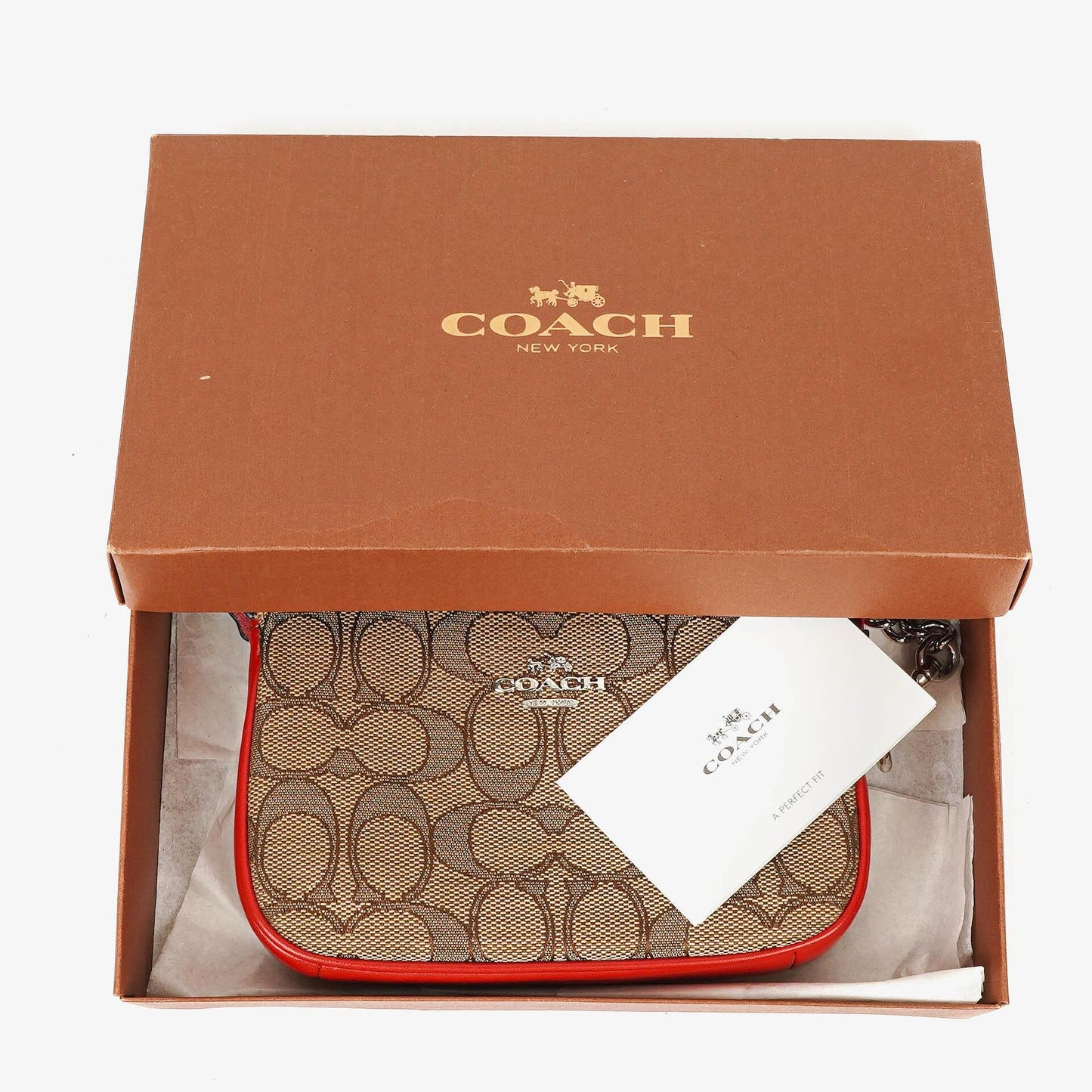Coach Nolita 15 Mini Tasche aus Signature Canvas