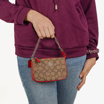 Coach Nolita 15 Mini Tasche aus Signature Canvas