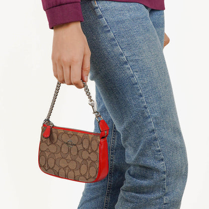 Coach Nolita 15 Mini Tasche aus Signature Canvas