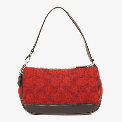 Coach Schultertasche aus roter Wolle