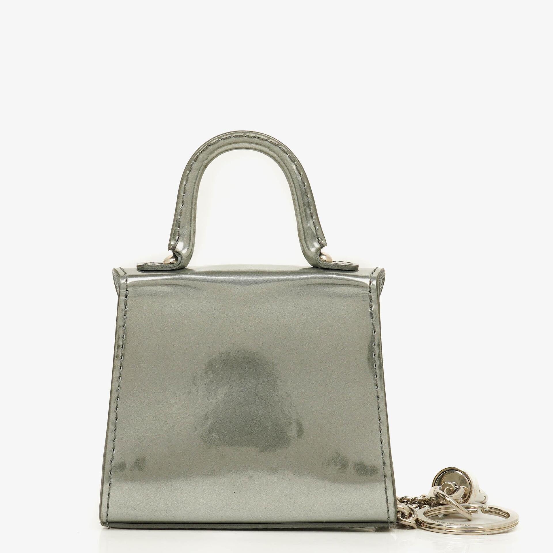 Delvaux Brillant Super Mini Charm Tasche aus Vernis
