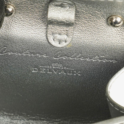 Delvaux Brillant Super Mini Charm Tasche aus Vernis