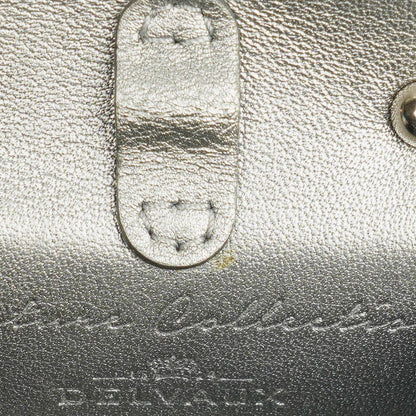 Delvaux Brillant Super Mini Charm Tasche aus Vernis