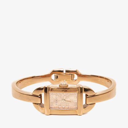 Gucci 6800L Armreif-Uhr aus goldfarbenem Edelstahl mit GG-Zifferblatt