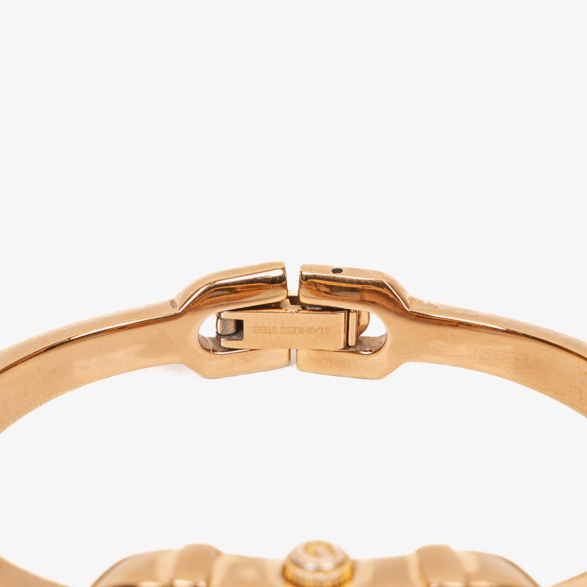 Gucci 6800L Armreif-Uhr aus goldfarbenem Edelstahl mit GG-Zifferblatt