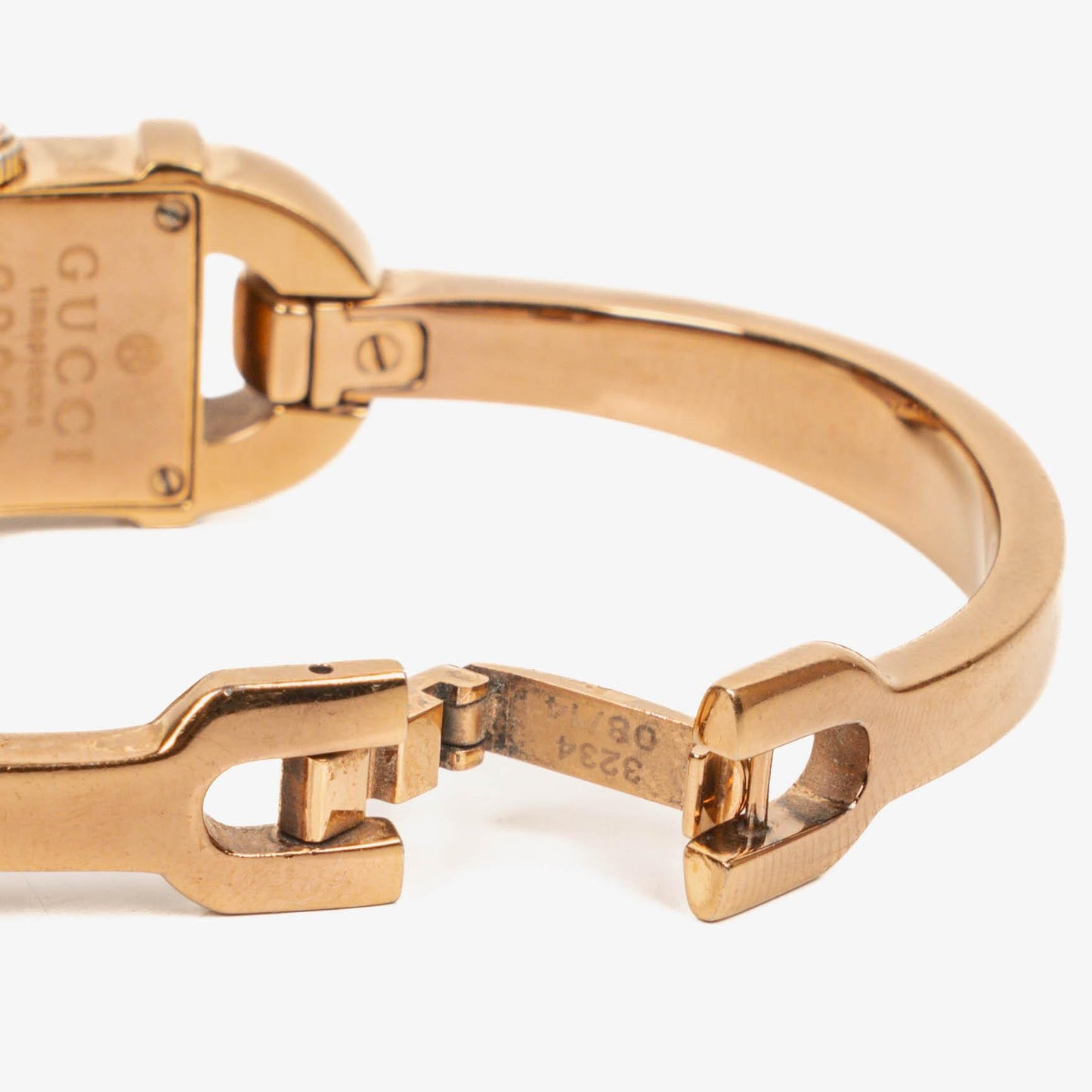 Gucci 6800L Armreif-Uhr aus goldfarbenem Edelstahl mit GG-Zifferblatt