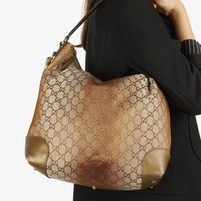 Gucci Heart-Bit Hobo-Tasche aus beigem Metallic Monogram GG Canvas