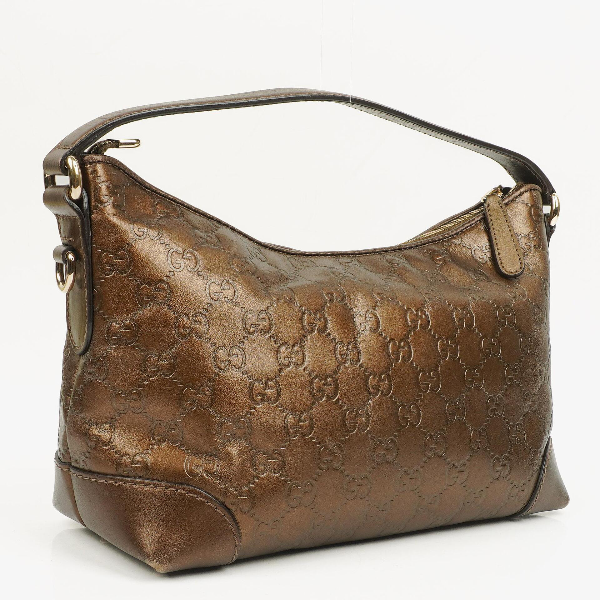 Gucci Heart Bit Hobo-Tasche aus bronzefarbenem Metallic Guccissima Leder